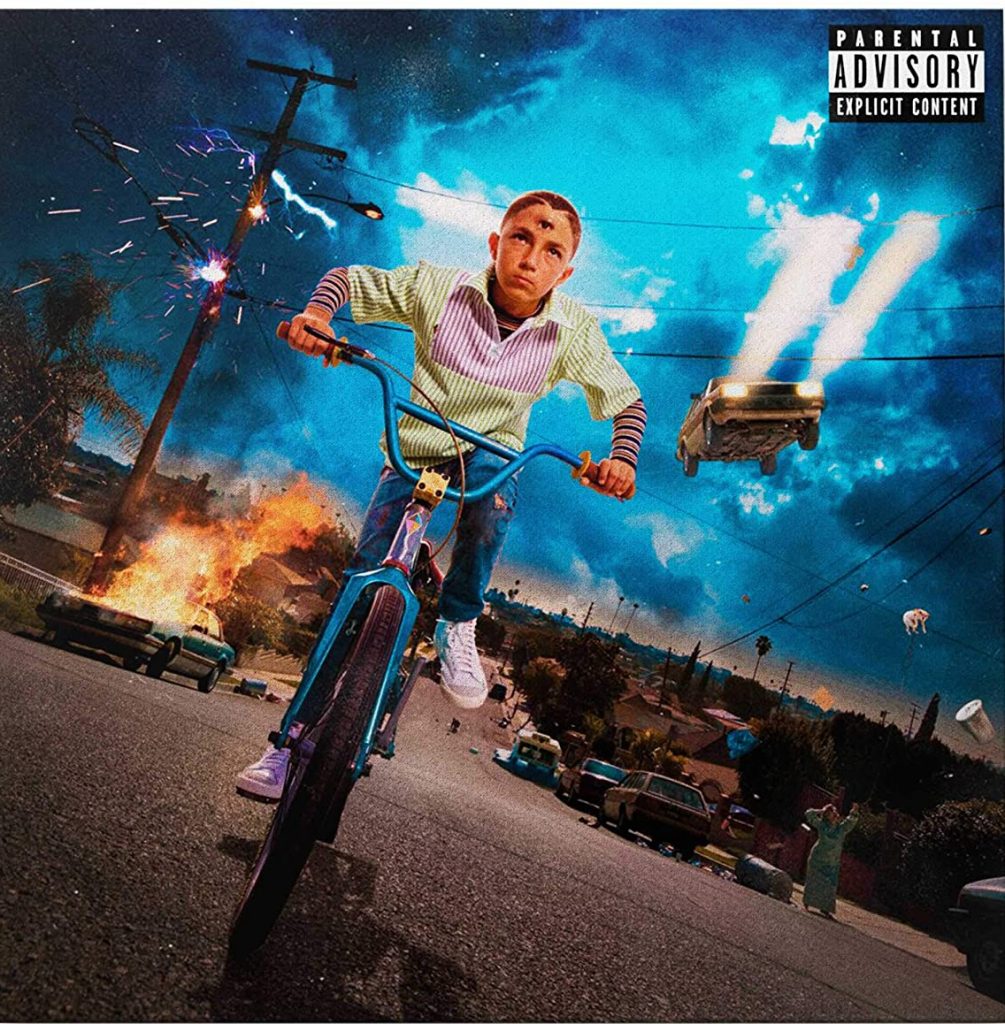 portada de album con niño montado en bicicleta